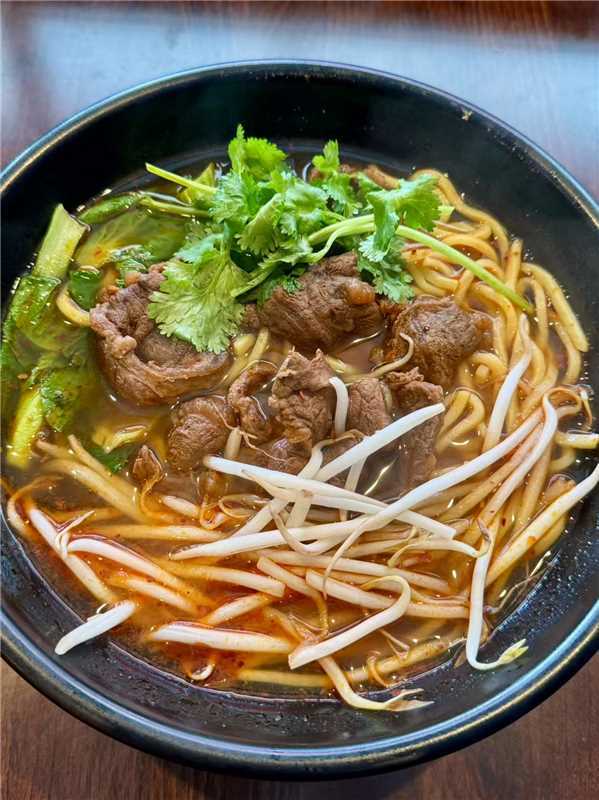 Asian-Cuisine-Noodles-&-Dumplings-Chinese-restaurant-Beef-Noodle-Soup-Mahopac Beef Noodle Soup - Noodles in a flavorful broth with tender beef, bean sprouts, and cilantro at Asian Cuisine Noodles & Dumplings, a Chinese restaurant in Mahopac