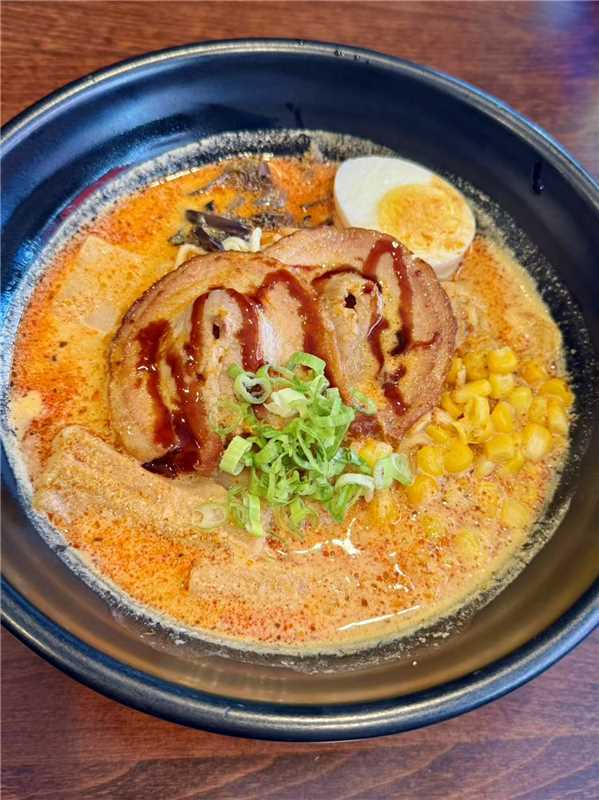 Asian-Cuisine-Noodles-&-Dumplings-Chinese-restaurant-Spicy-Pork-Ramen-Mahopac Spicy Pork Ramen - Spicy ramen broth with slices of pork, half - boiled egg, corn, and scallions at Asian Cuisine Noodles & Dumplings, a Chinese restaurant in Mahopac