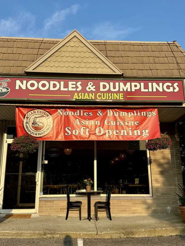Asian-Cuisine-Noodles-&-Dumplings-Chinese-restaurant-Storefront-Mahopac Storefront - “Noodles & Dumplings” signage + soft - opening banner outside Asian Cuisine Noodles & Dumplings, a Chinese restaurant in Mahopac